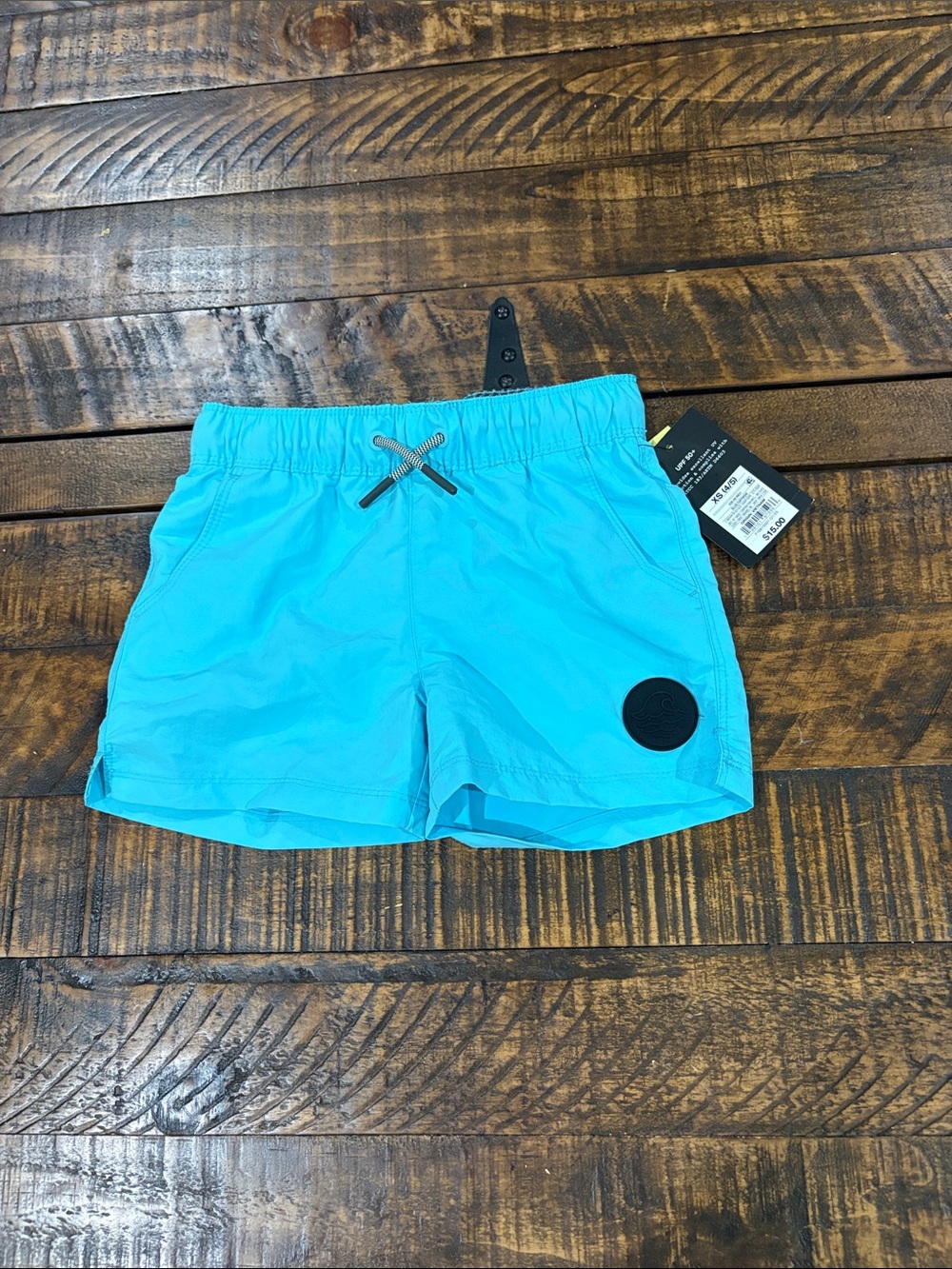 Swim Shorts with Waist Tie in blue turquoise color
